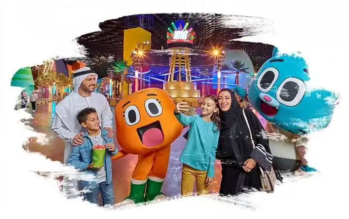 Kids taking a selfie with a cartoon character and family at IMG Worlds of Adventure Dubai.