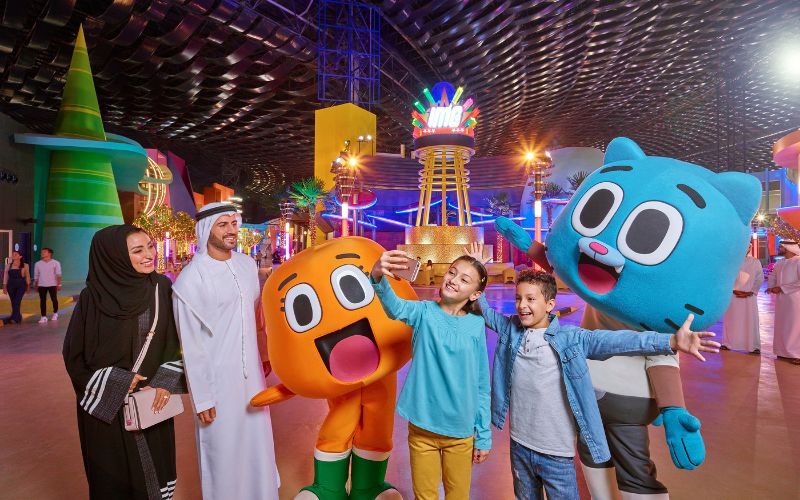 People taking selfies with Gumball at IMG Worlds of Adventure Dubai