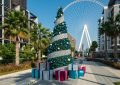 Christmas tree on background Dubai Eye on Bluewaters Island