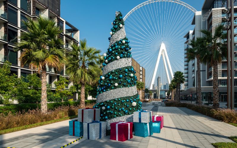 Christmas tree on background Dubai Eye on Bluewaters Island