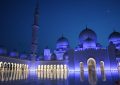 Sheikh Zayed Grand Mosque illuminated at night during Islamic New Year celebrations